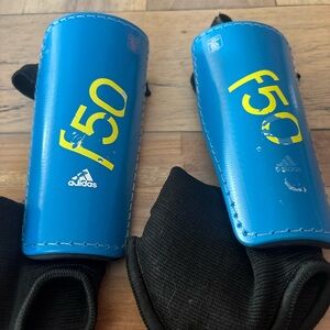 adidas Blue Soccer Shin Guards with Black Sleeves